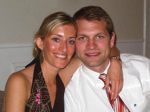 A couple exhibiting the red eye effect